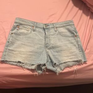 AG Adriano Goldschmied light wash denim shorts.      Style: The BRYN